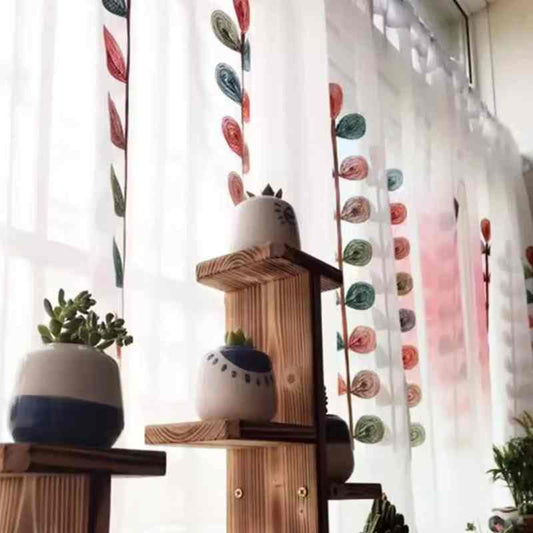 Detail broderies feuilles ovales multicolores brise-bise Botaneo MonUniversRideau