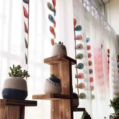 Detail broderies feuilles ovales multicolores brise-bise Botaneo MonUniversRideau